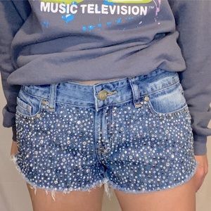 Victoria’s Secret PINK rhinestone jean shorts.